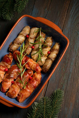 Traditional Christmas dish Sausages wrapped in bacon