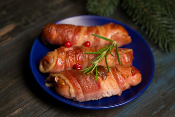 Traditional Christmas dish Sausages wrapped in bacon