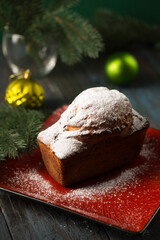 Fototapeta na wymiar Delicious Christmas cupcake with powdered sugar
