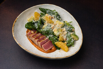 Tuna tataki with salad. close-up