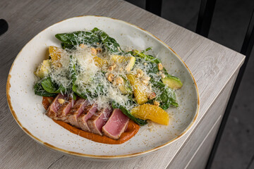 Tuna tataki with salad. close-up