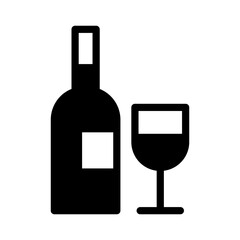 A wine bottle and a half-filled glass