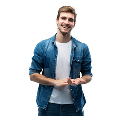 Portrait of stylish, stunning man in denim outfit standing over transparent