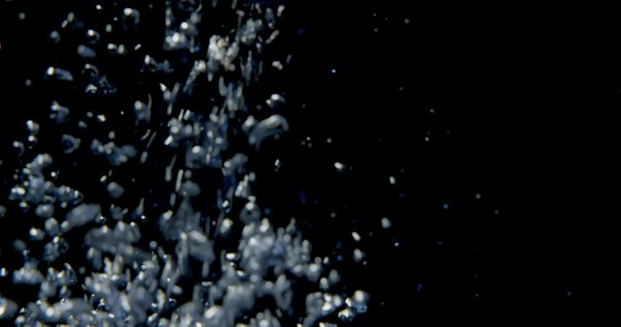 Bubbles in mineral water, slow motion. High quality 4k footage