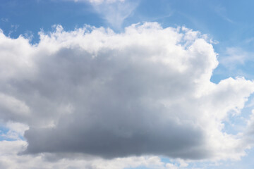 Obraz premium Large thunderclouds on the blue sky.