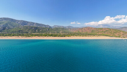 Captured the breathtaking beauty of Cirali Beach in Antalya, Turkey on a spectacular summer day in 2023, using a drone to explore the coastline and the majestic mountains in the background.