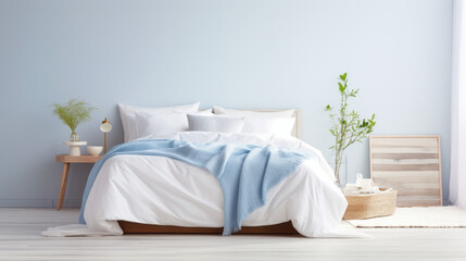 a bright and airy bedroom with a crisp white and blue palette The walls are painted white with pale blue accents and the bed is covered with white sheets and a blue quilt