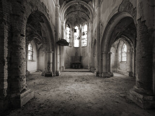 wide angle view to central interior abandoned cathedral in black and white style