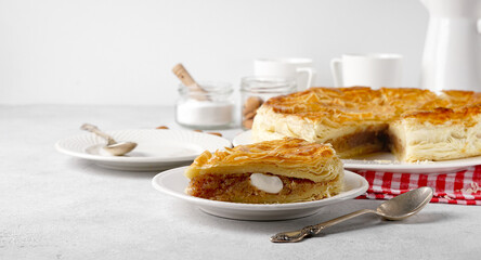 A piece of Homemade Twelfth Night cake with a the charm inside, copy space