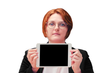 Woman teacher sits at a table with a tablet in her hands, copy space, isolated on a white background. Online education at school and university