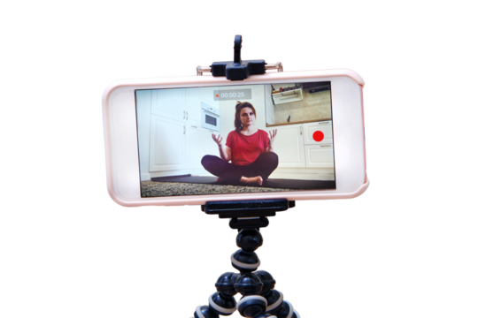 Record a video lesson on training sport at home for the channel on the Internet, isolated on a white background. Individual fitness in the home kitchen on isolation due to the flu virus pandemic.