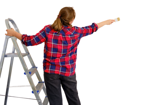Painter in a plaid shirt paints the wall with white paint, isolated on a white background - Powered by Adobe