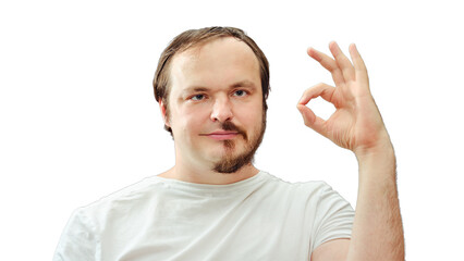Adult man with a half beard smiling shows ok gesture. Concept of self-cutting and shaving during...