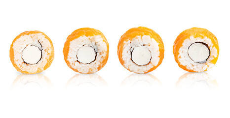 Four slices of asian healthy sushi roll snack made with raw or smoked salmon, boiled rice, nori seaweed and cream cheese isolated on white background with reflection served for dinner or as appetiser