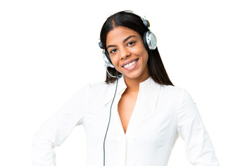 Telemarketer African American woman working with a headset over isolated chroma key background...