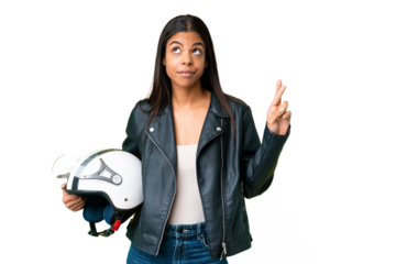 Young African American woman with a motorcycle helmet over isolated chroma key background with fingers crossing and wishing the best