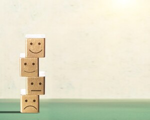 Obraz premium Satisfaction survey. Wooden cube with face symbol.