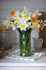 a bouquet of daffodils, garden flowers. concept: spring, rural composition, cottage core.