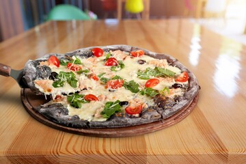 Delicious fresh pizza with mozzarella and vegetables