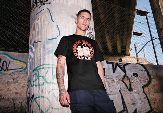 Mockup of man wearing t-shirt with customizable color and design by graffiti, camera flash
