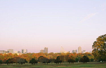 View of downtown Raleigh skyline from Dix Park with Fall foliage