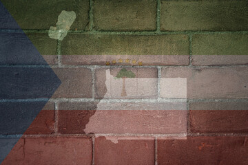 map and flag of equatorial guinea on a old brick wall