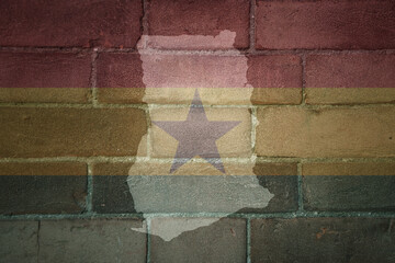 map and flag of ghana on a old brick wall
