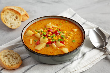 Homemade Corn Chowder in a Bowl, side view.