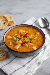 Homemade Corn Chowder in a Bowl, side view.