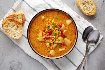 Homemade Corn Chowder in a Bowl, top view. Flat lay, overhead, from above. Close-up.