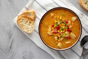 Homemade Corn Chowder in a Bowl, top view. Flat lay, overhead, from above. Copy space.