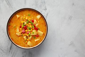 Homemade Corn Chowder in a Bowl, top view. Flat lay, overhead, from above. Copy space.