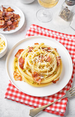 Bacon cheese green pea pasta in a plate