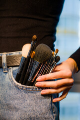 Makeup brushes: the secret to a makeup artist's skill, a variety of makeup brushes of different shapes and sizes. 