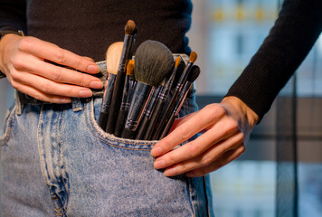 Makeup brushes: the secret to a makeup artist's skill, a variety of makeup brushes of different...