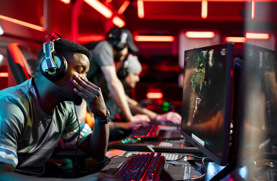 Professional gamer experiencing defeat losing tournament saddened by loss