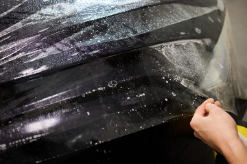 Protection of hood and front of the car with a colorless protective film.