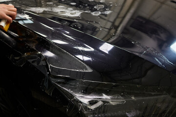 Protection of hood and front of the car with a colorless protective film.