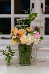 a glass bouquet of roses