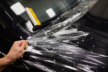Protection of hood and front of the car with a colorless protective film.