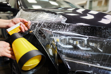 Protection of hood and front of the car with a colorless protective film.