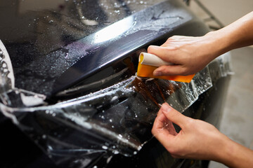 Protection of hood and front of the car with a colorless protective film.