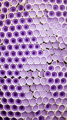 A pattern of lavender and white circles forming a honeycomb