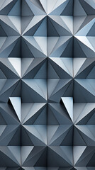 A pattern of interlocking triangles in shades of grey