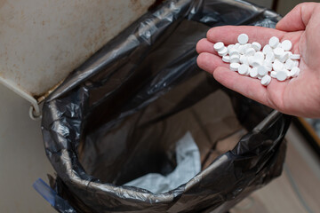 Throwing pills into the garbage - illegal disposal