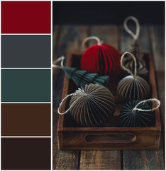 Design palette colour swatch inspired by cozy Christmas still life with handmade craft decor. Designer pack with photo, swatches. Harmonious warm colours, combination brown, beige, green, red