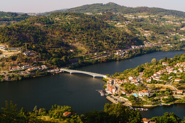 Landscape of Douro Valley in Portugal near by village with a bridge in the middle of Douro river.