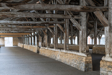 Medieval covered market hall oak roof structure - Cremieu France Europe