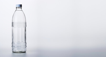 bottle of mineral water on white background - obrazy, fototapety, plakaty