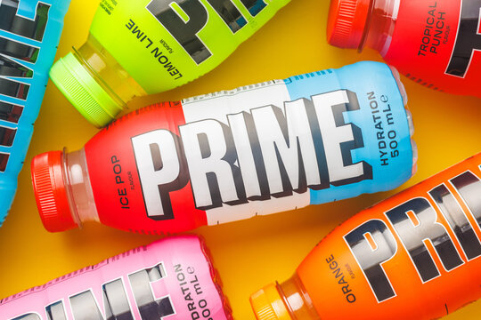 Prime Energy Drink . Bottle drink on yellow background. Top view.